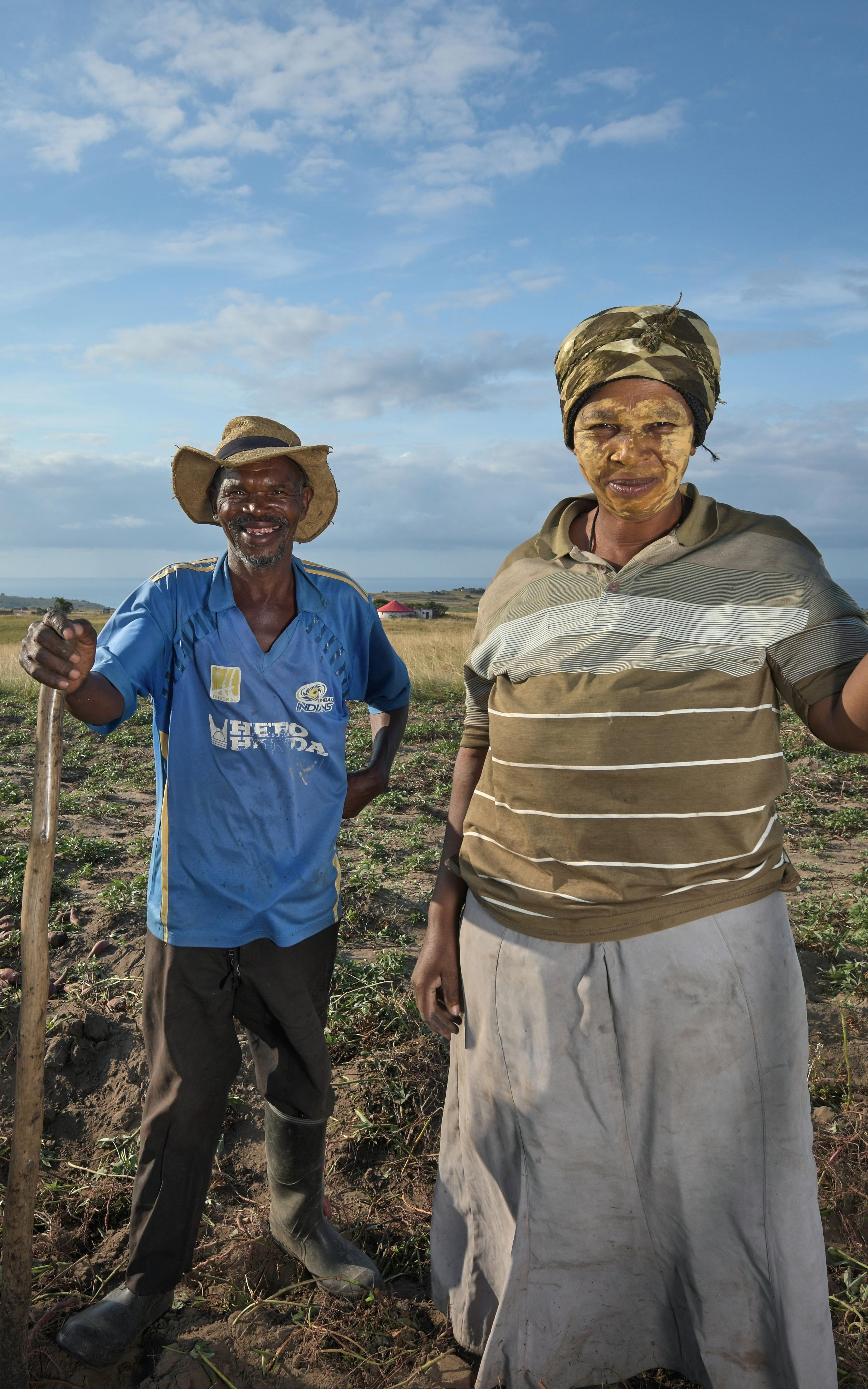 Farmers in a field. 