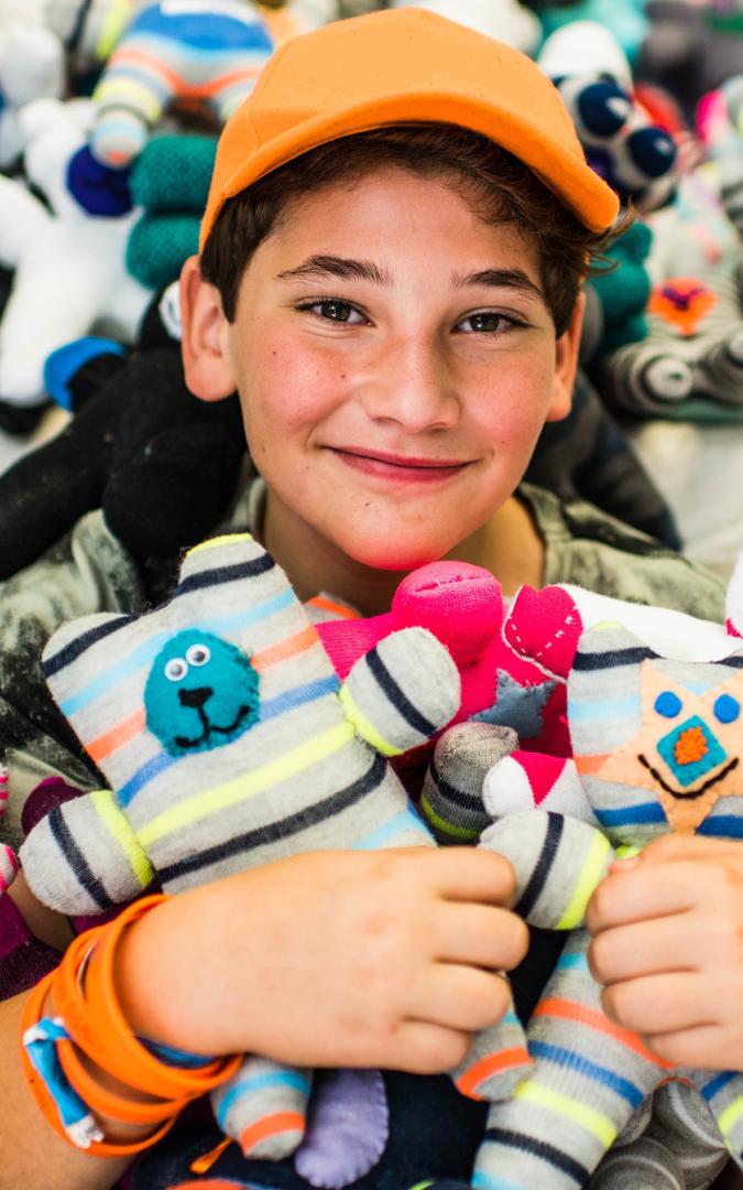 Boy with teddy bears