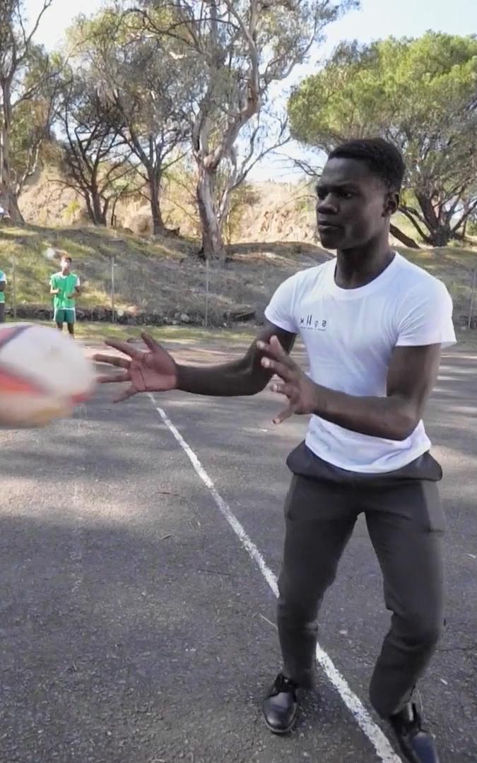 Man catching a ball. 