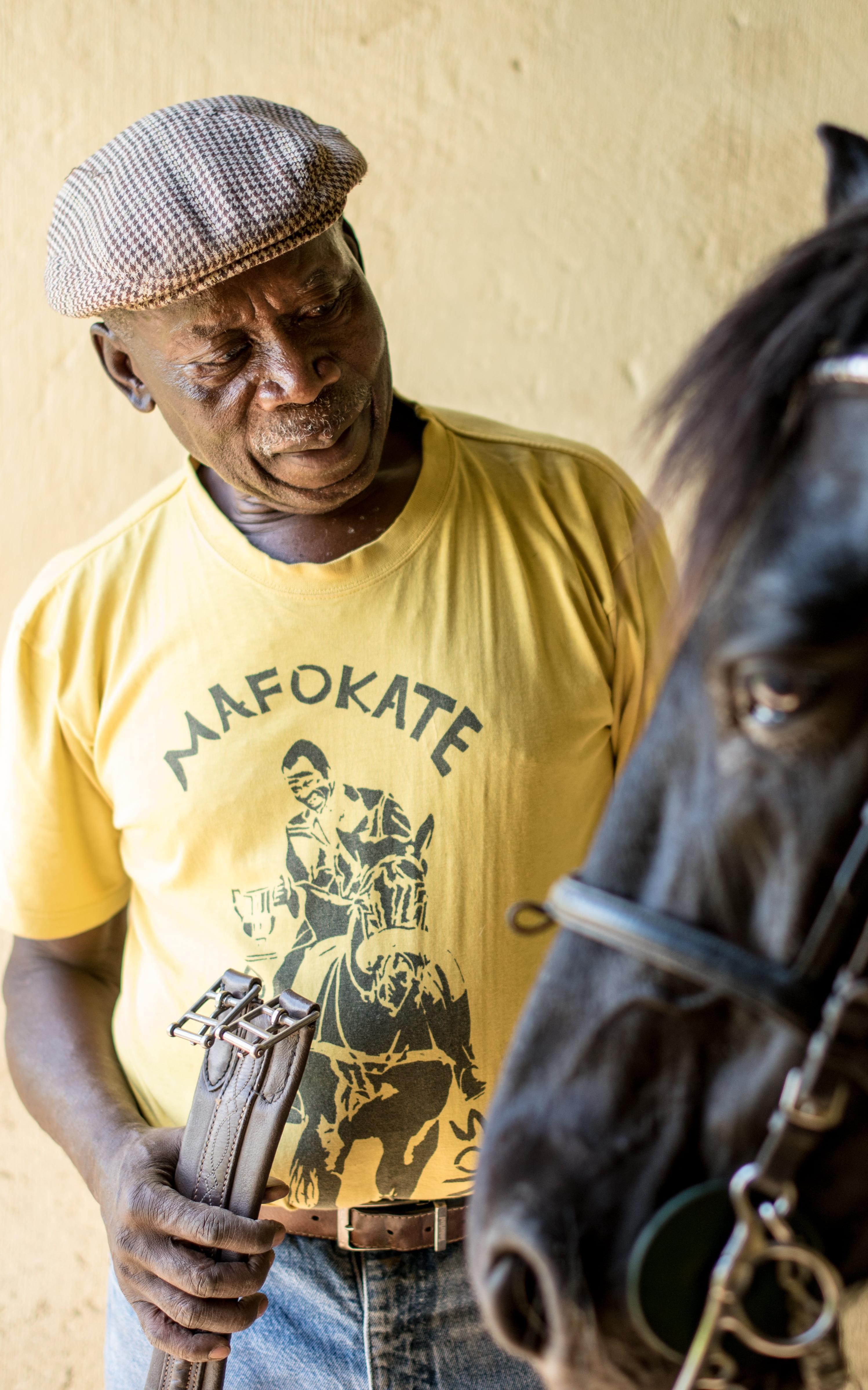 Black man with a horse