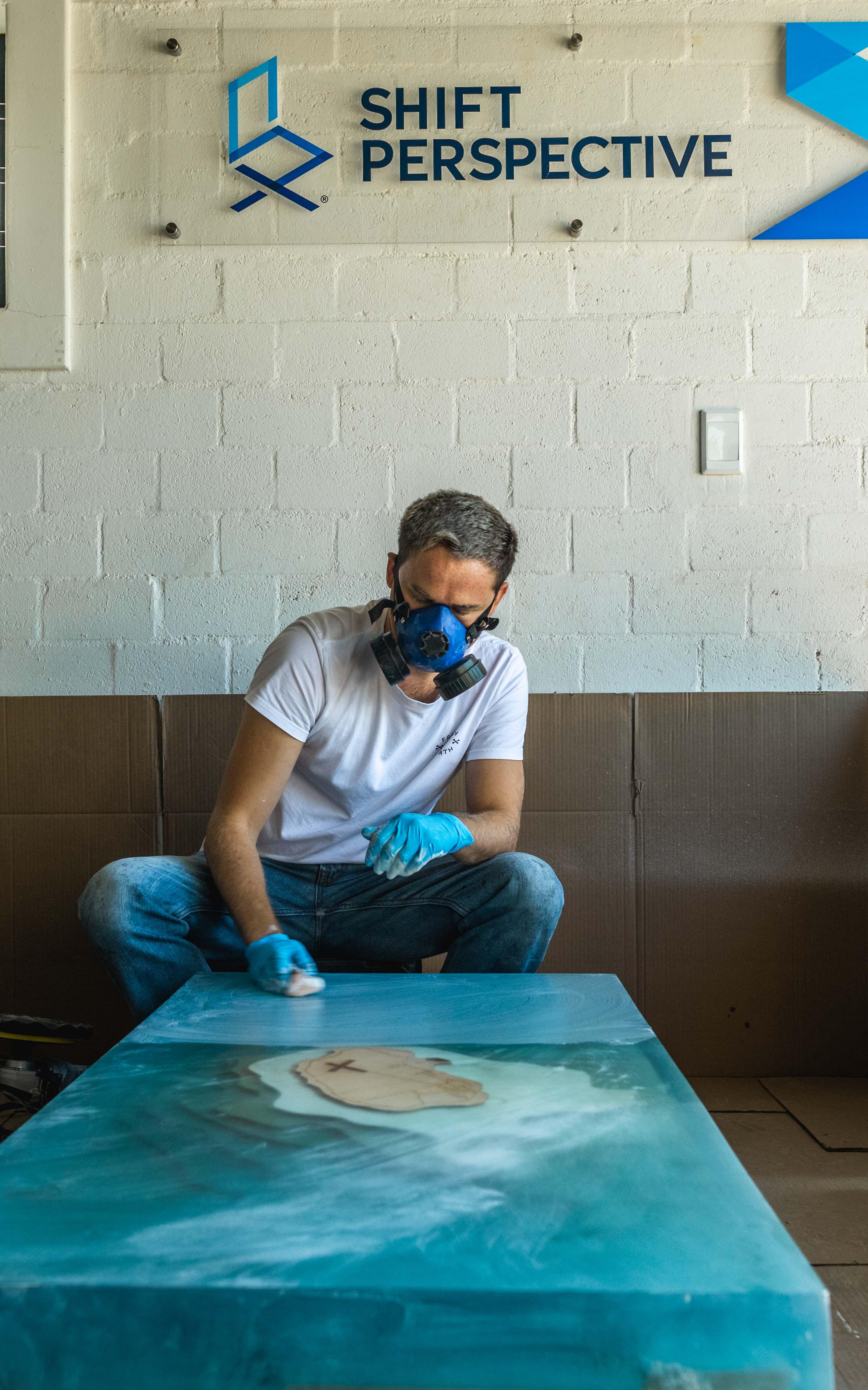 Man painting a canvas