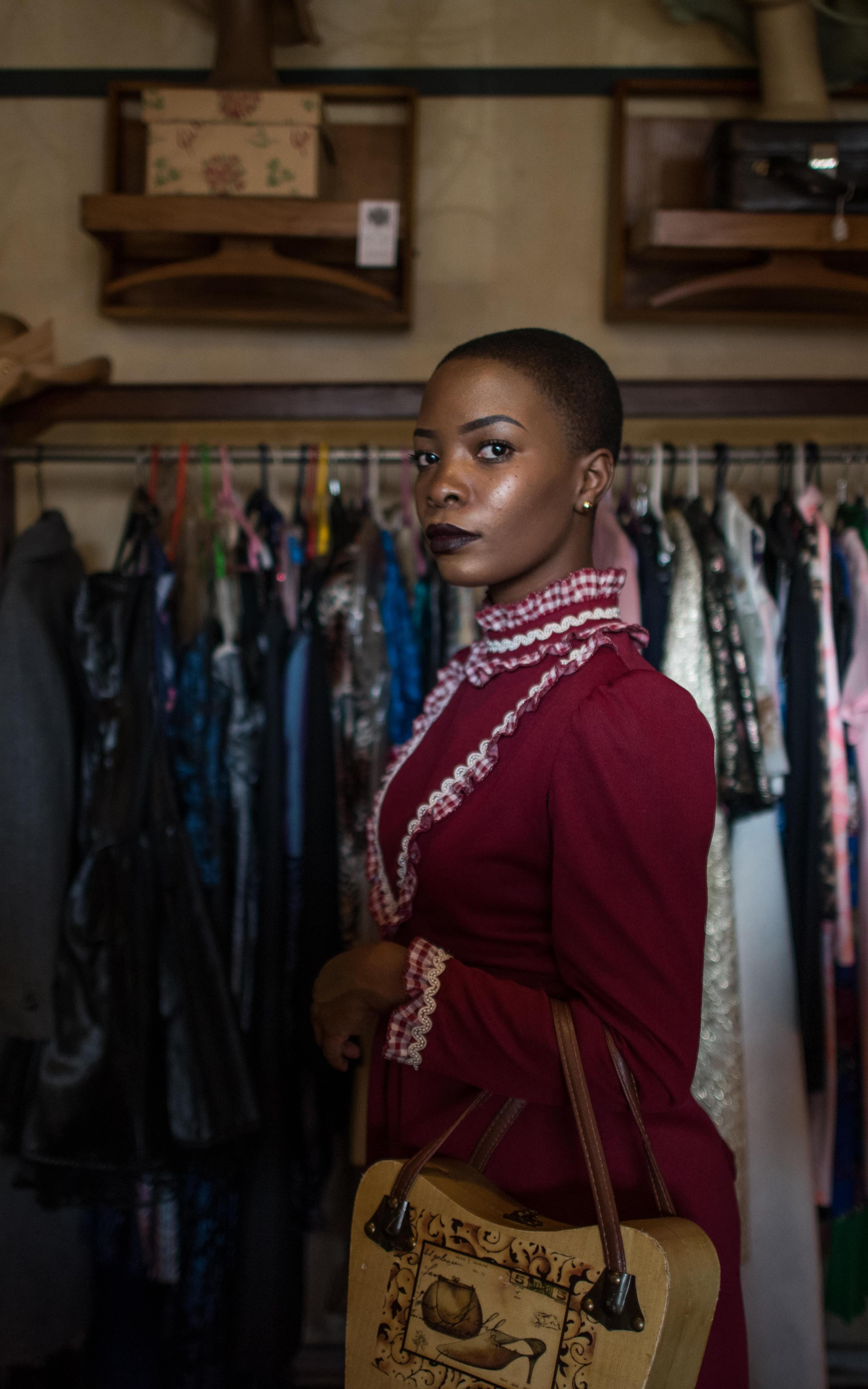 Woman standing in clothing store