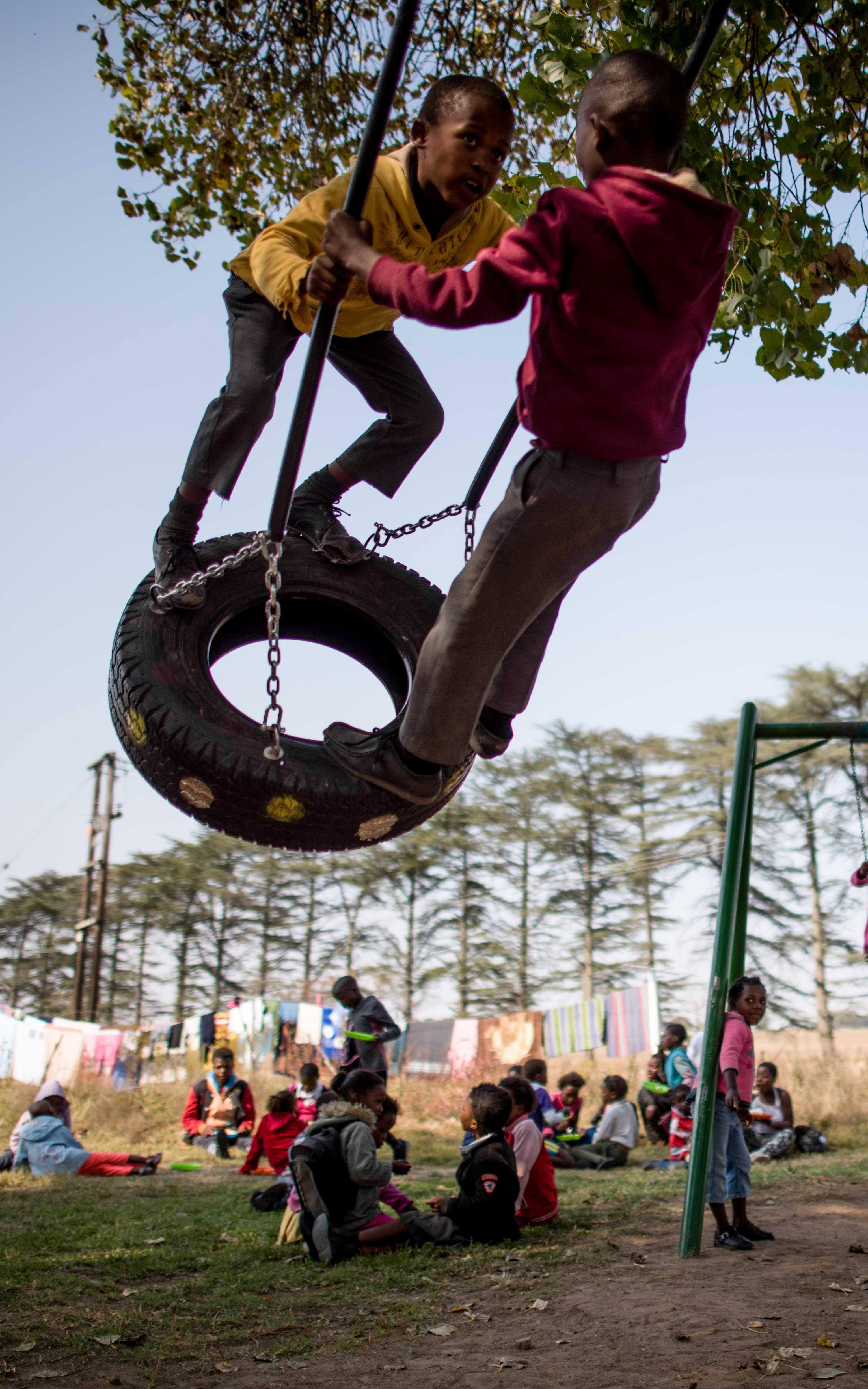 Kids playing on playground. 