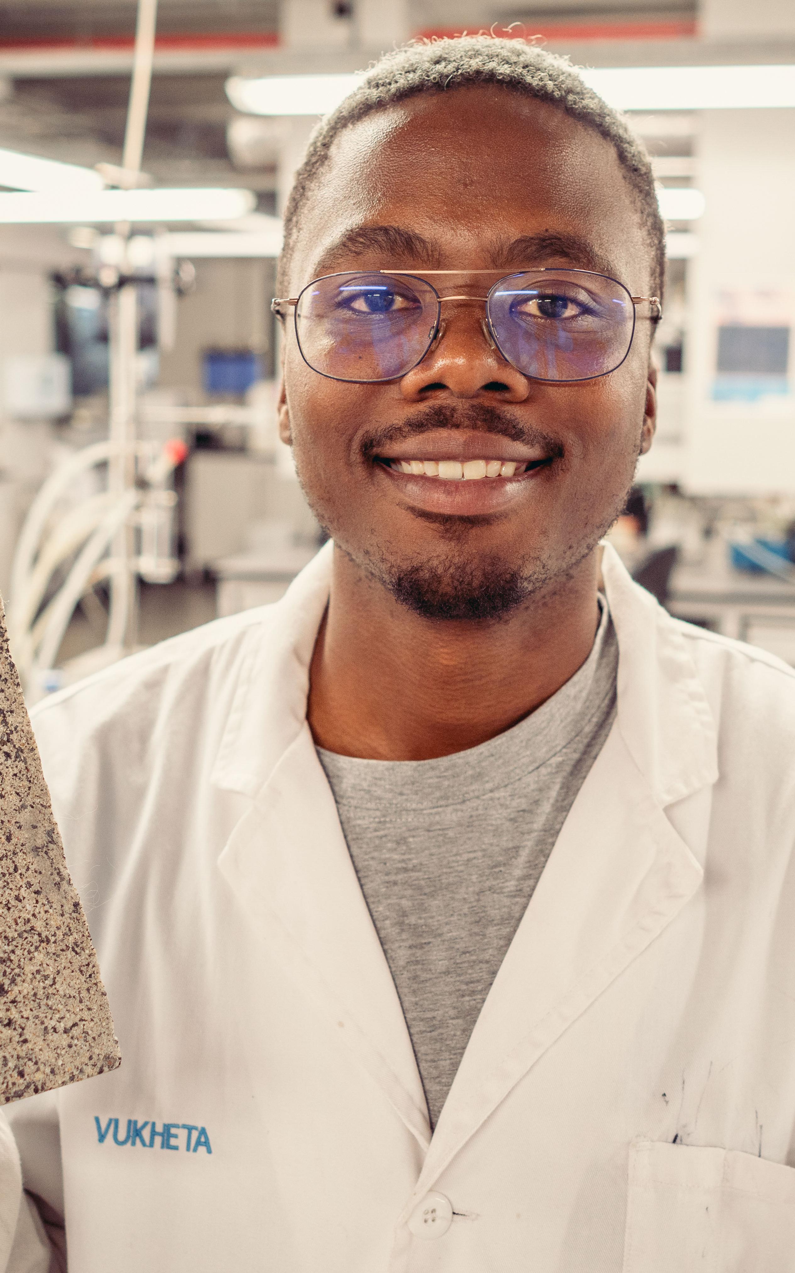 Man in lab.