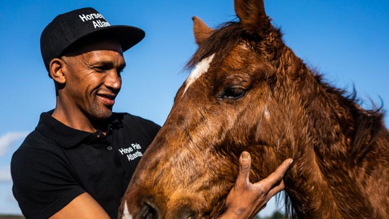taking care of horses helping him to take care of himself.