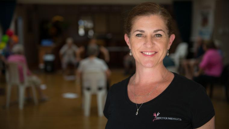 White woman with blurry background