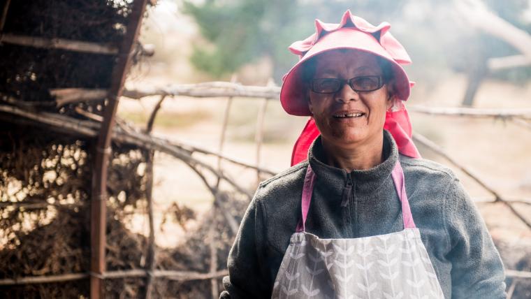 Woman in apron.