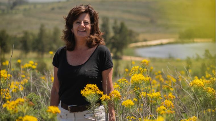 Woman in field of flowers